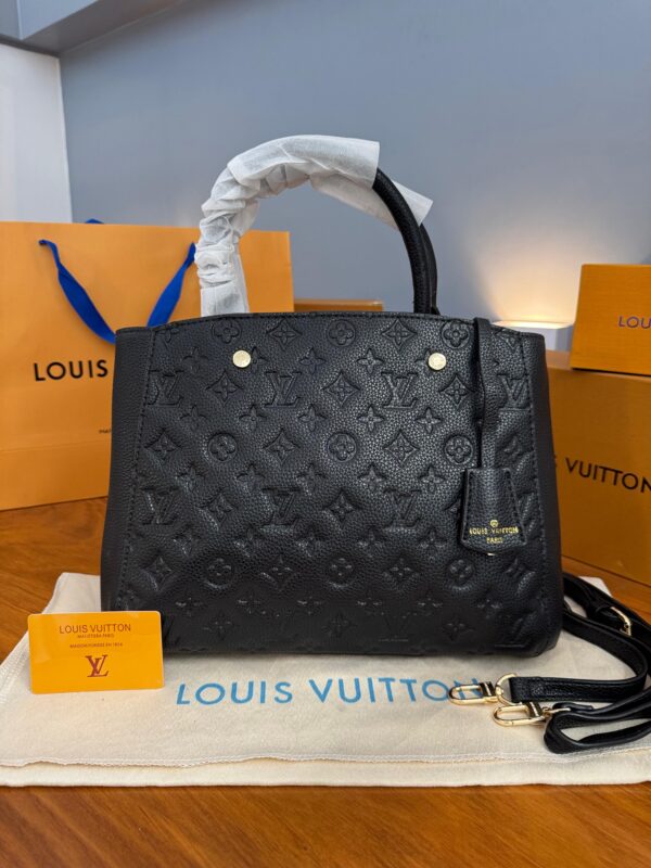 Cartera MONTAIGNE MONOGRAM EMPREINTE NEGRO