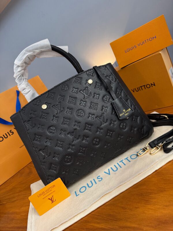 Cartera MONTAIGNE MONOGRAM EMPREINTE NEGRO