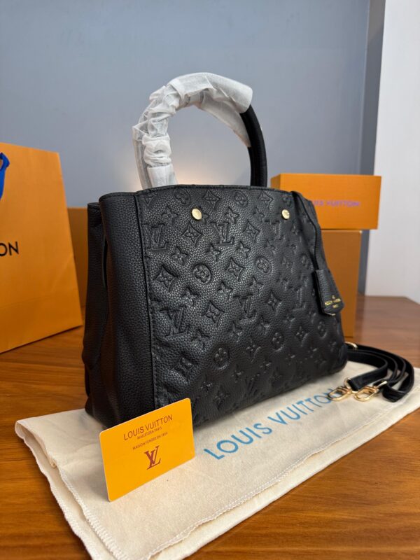 Cartera MONTAIGNE MONOGRAM EMPREINTE NEGRO